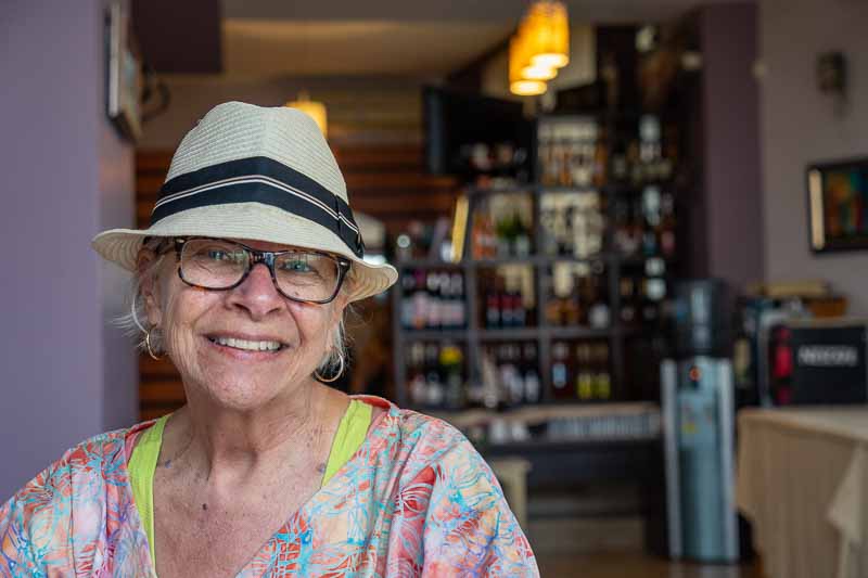 Cindy in a cafe escaping from the rain