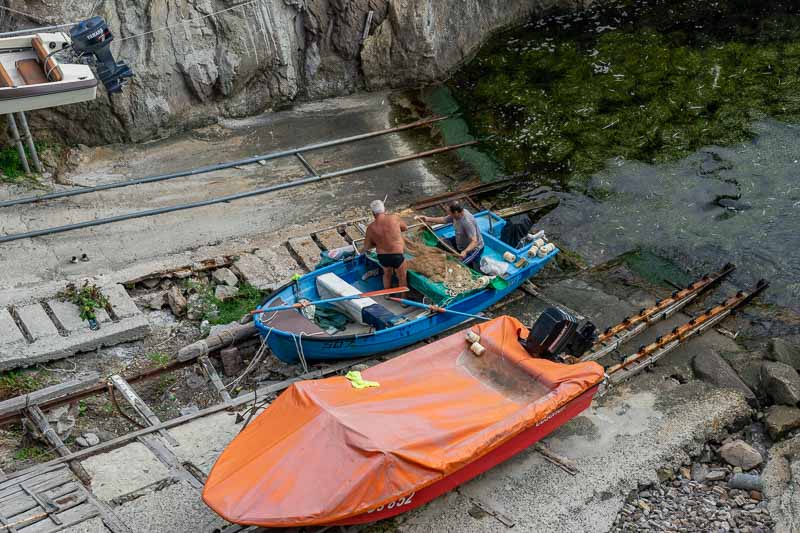 Fishermen preparing their nets.